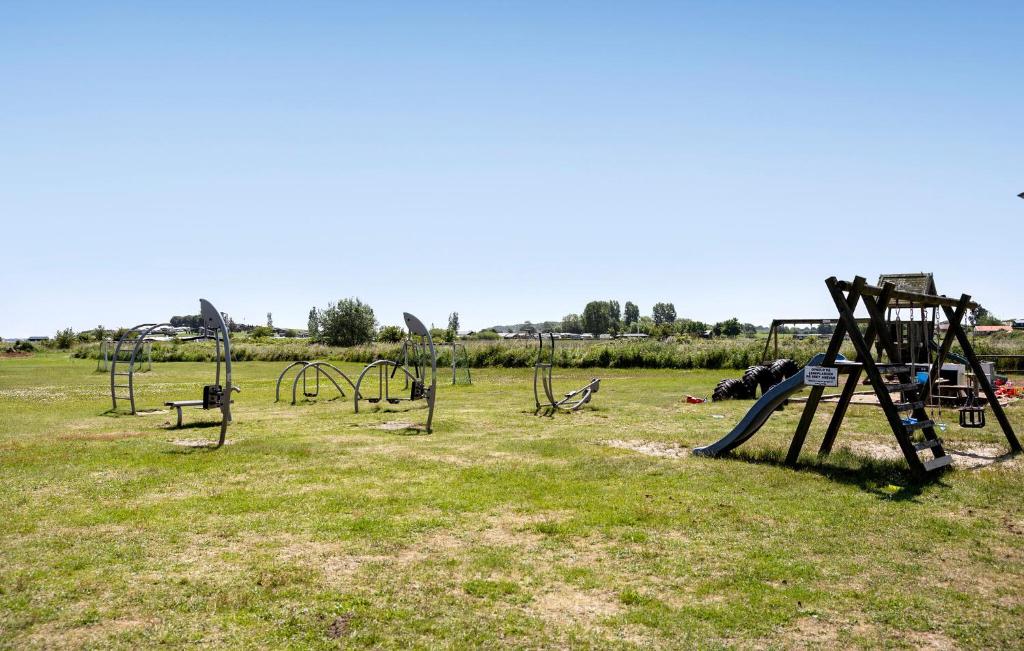 an empty park with an empty playground with at Nice Home In Haderslev With Wifi in Haderslev