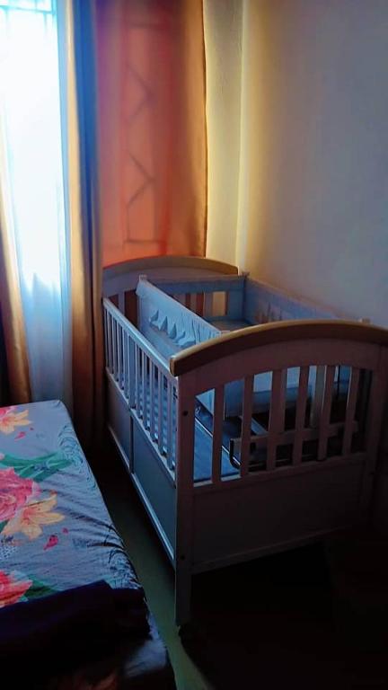 Postel nebo postele na pokoji v ubytování Lgl lodge