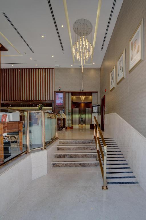 A área de receção ou átrio de Hawthorn Extended Stay by Wyndham Abu Dhabi City Center