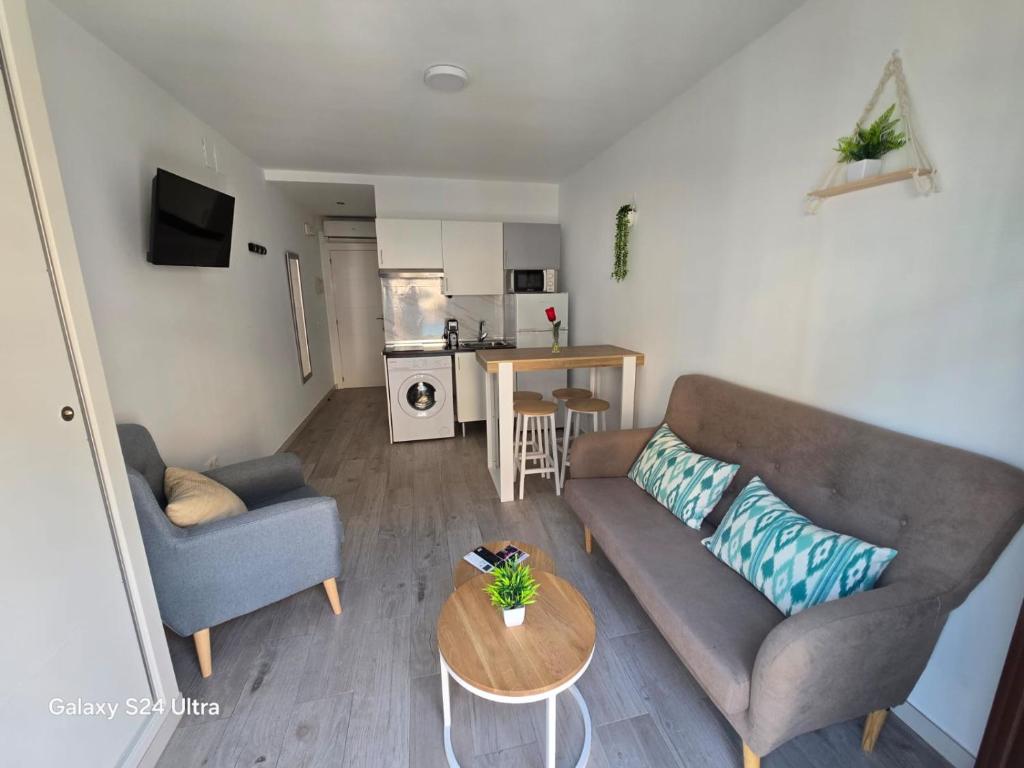 A kitchen or kitchenette at San Pablo Rooms