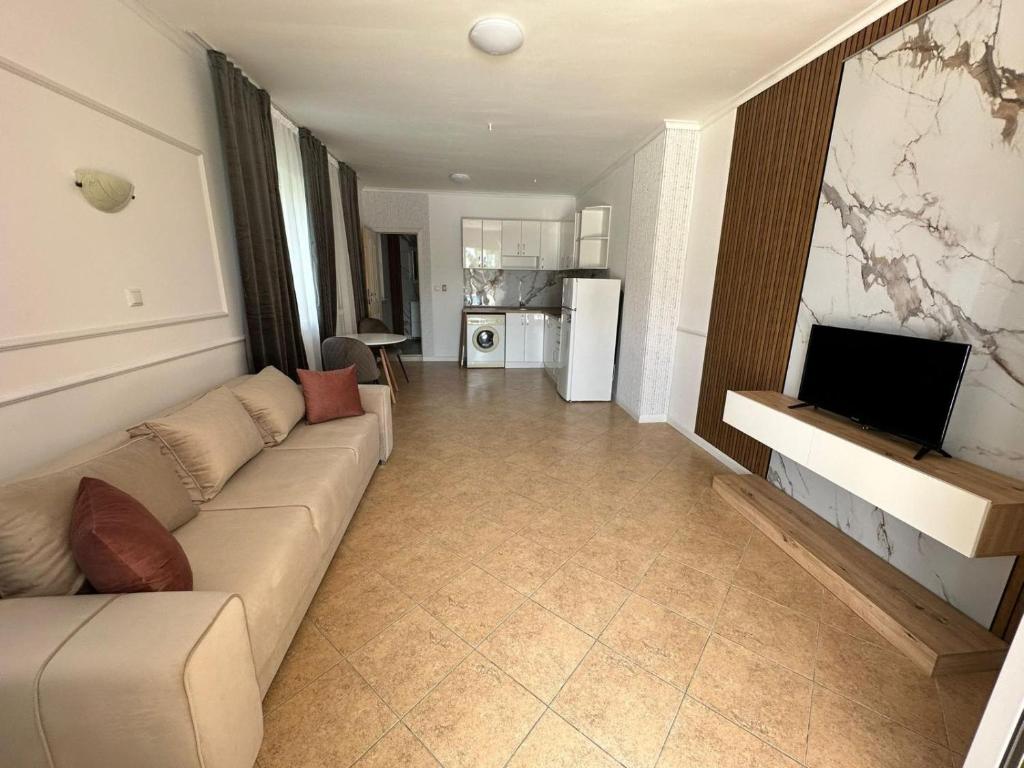 TV a/nebo společenská místnost v ubytování Horizont Apartments