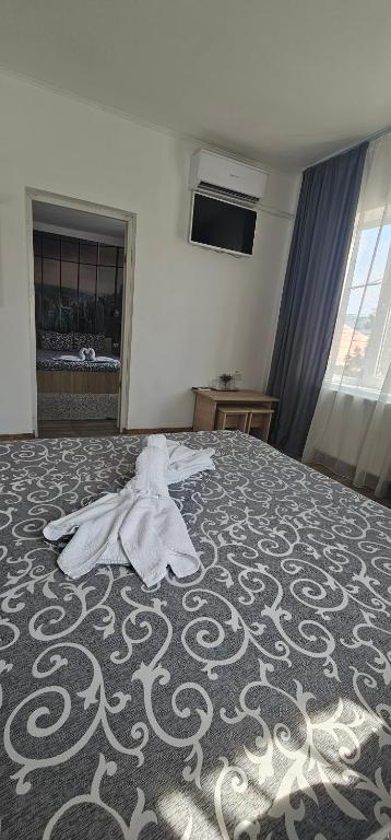 Postel nebo postele na pokoji v ubytování Sîrbu Orsova