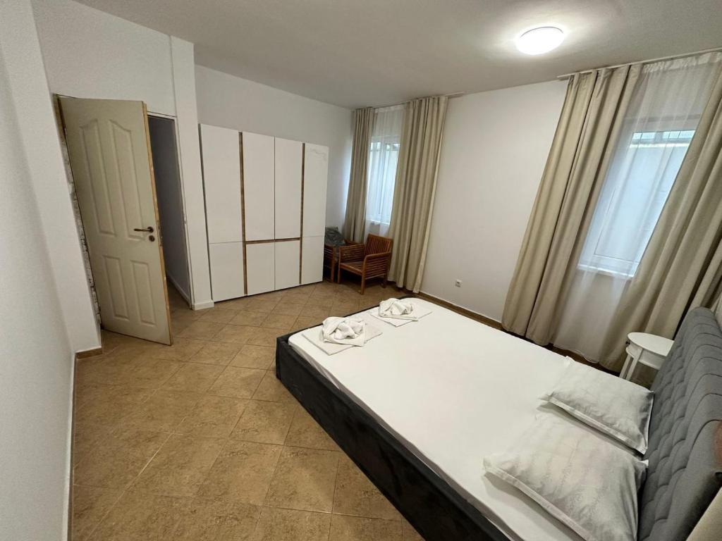 Postel nebo postele na pokoji v ubytování Horizont Apartments