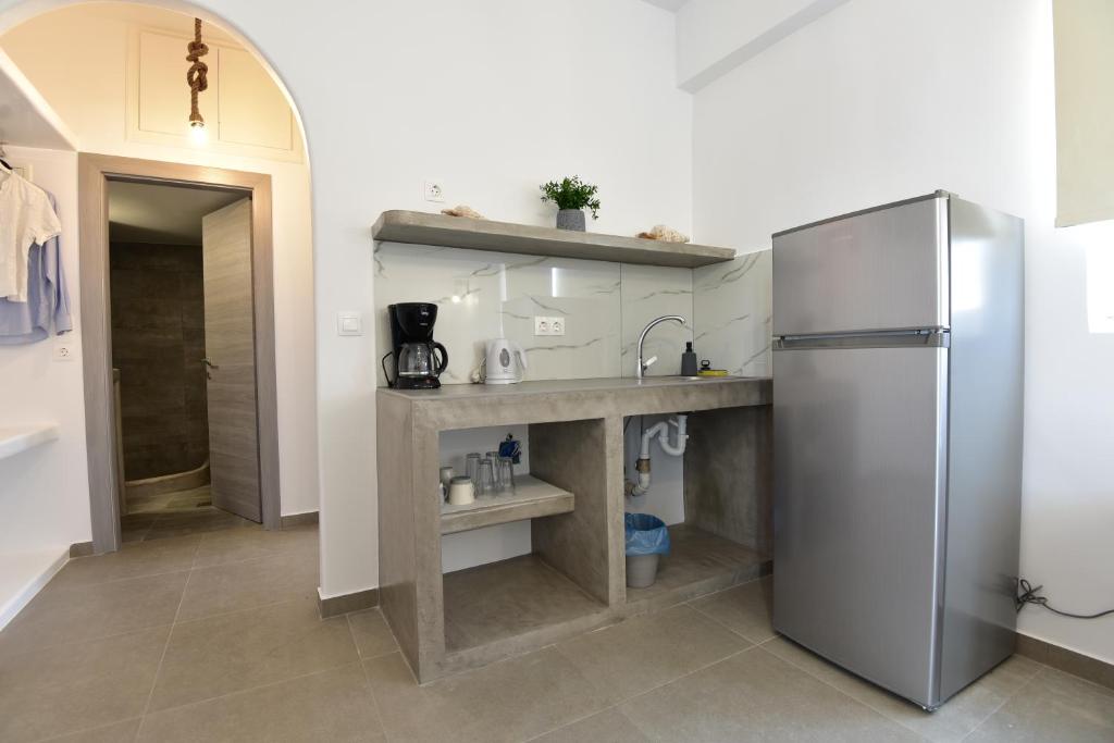 Kuchyň nebo kuchyňský kout v ubytování Muses Rooms Milos