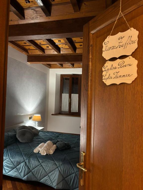 Postel nebo postele na pokoji v ubytování Borgo dei Duchi