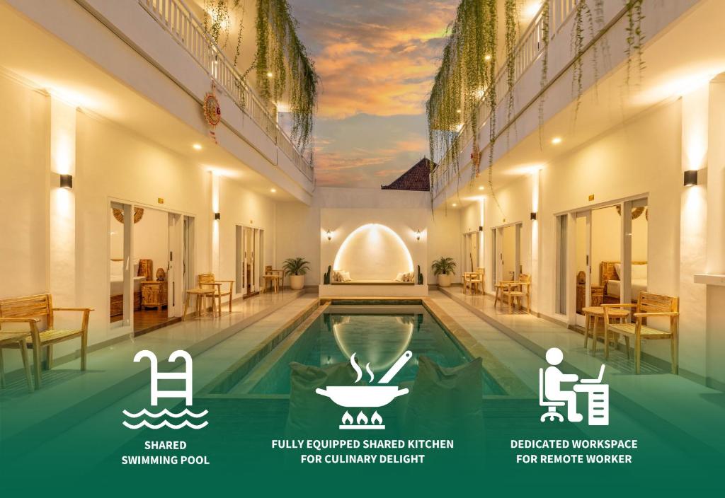 a pool in a building with a painting of a sky at Mo Cactus by Bukit Vista in Tumbak Bayuh