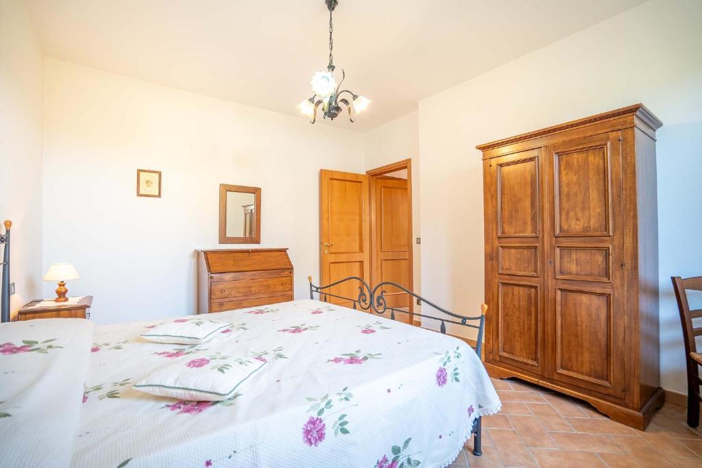 Postel nebo postele na pokoji v ubytování Stella fiorita