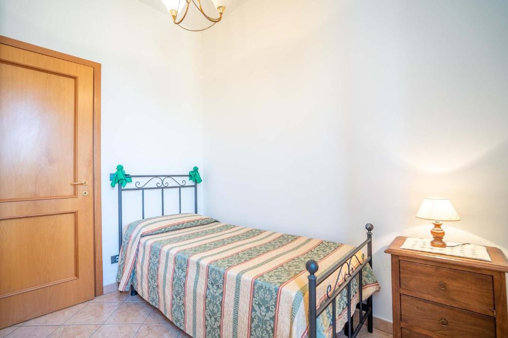 Postel nebo postele na pokoji v ubytování Stella fiorita