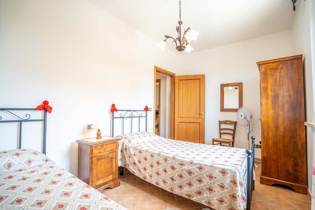Postel nebo postele na pokoji v ubytování Stella fiorita