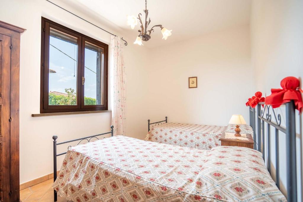 Postel nebo postele na pokoji v ubytování Stella fiorita