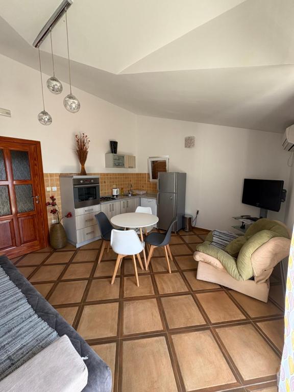 Kuchyň nebo kuchyňský kout v ubytování Apartments Ćuković