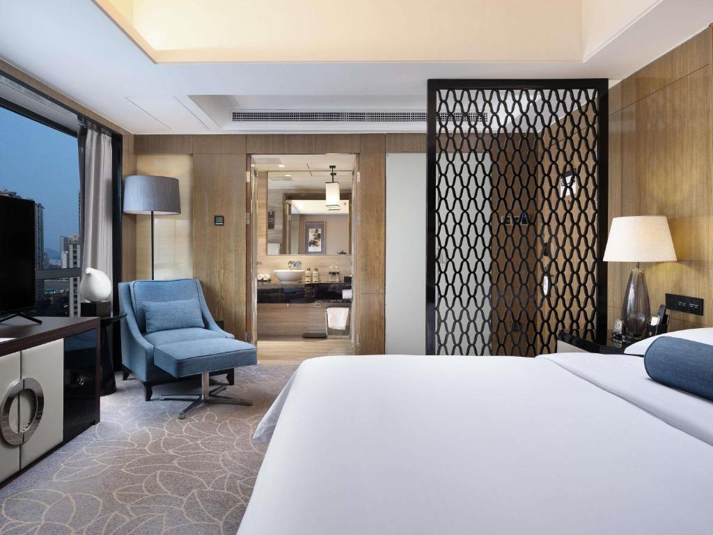Postel nebo postele na pokoji v ubytování Pullman Shanghai Jingan