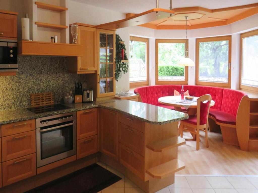 A kitchen or kitchenette at holiday home Emberger, Fügen