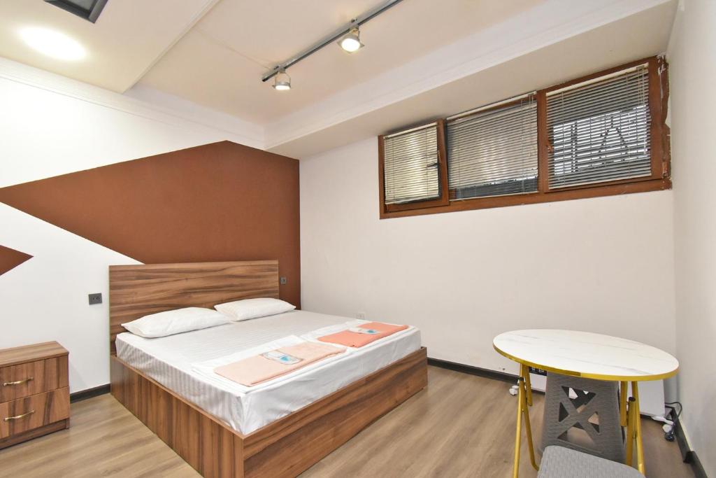 Postel nebo postele na pokoji v ubytování City-Lime Guest House
