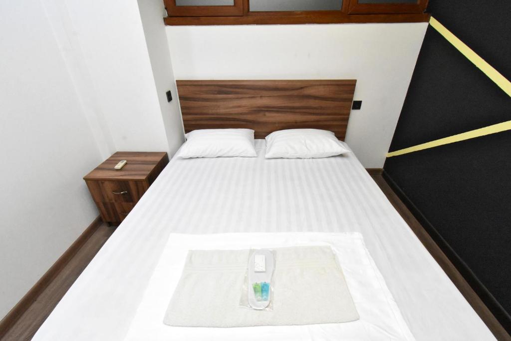 Postel nebo postele na pokoji v ubytování City-Lime Guest House