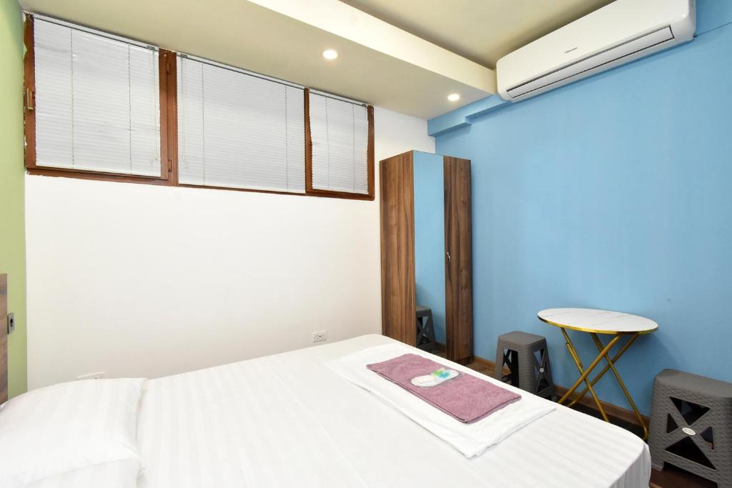 Postel nebo postele na pokoji v ubytování City-Lime Guest House