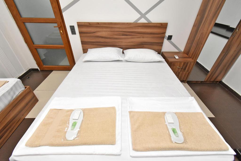 Postel nebo postele na pokoji v ubytování City-Lime Guest House