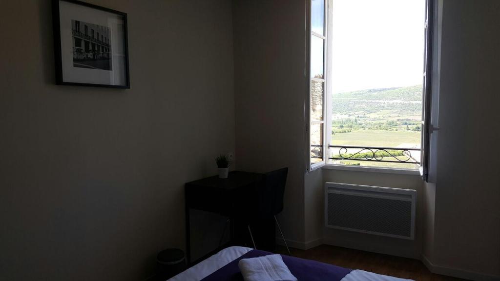 Postel nebo postele na pokoji v ubytování Hotel Belvue
