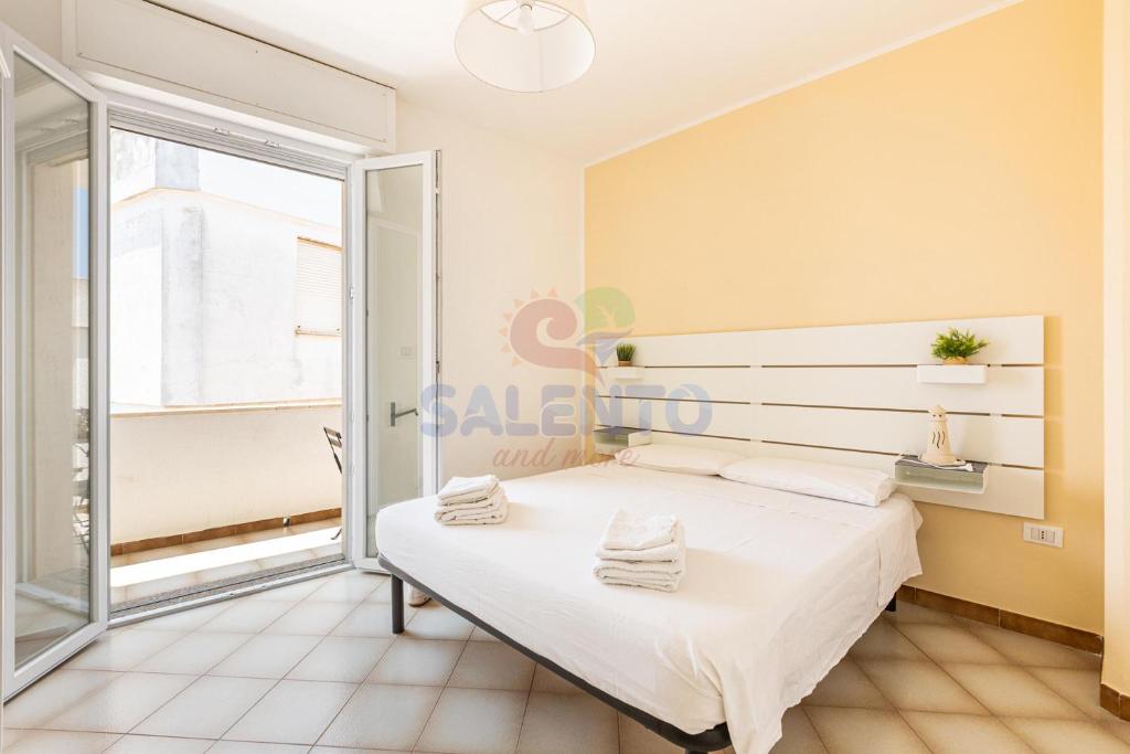 Postel nebo postele na pokoji v ubytování Salentoandmore - Affaccio sul mare