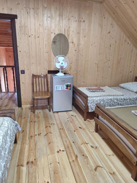 Postel nebo postele na pokoji v ubytování садиба ТУГАН-ДВІР