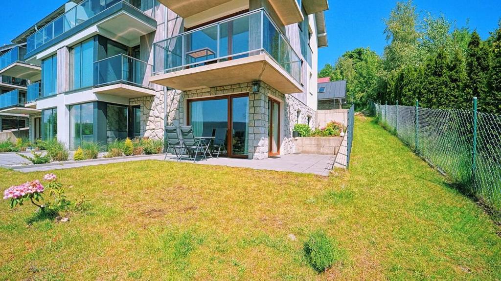 Vonkajšia záhrada v ubytovaní Apartamenty EverySky - Izerska 8