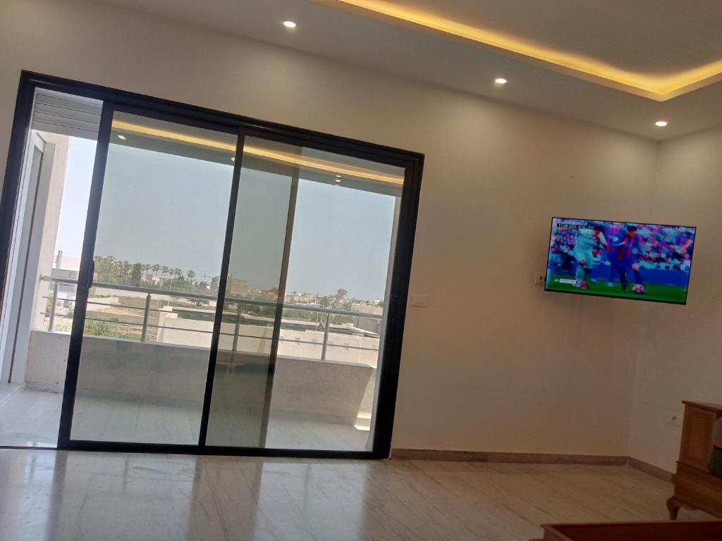 TV a/nebo společenská místnost v ubytování DarNejib, ElWafa city - north Hammamet