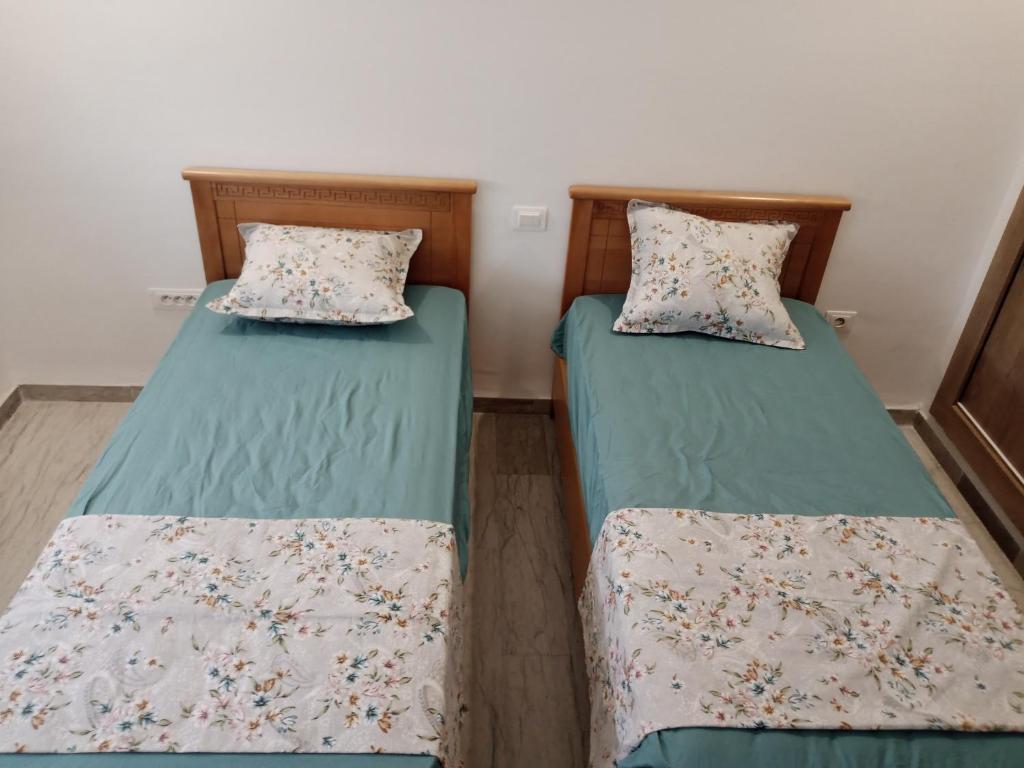 Postel nebo postele na pokoji v ubytování DarNejib, ElWafa city - north Hammamet