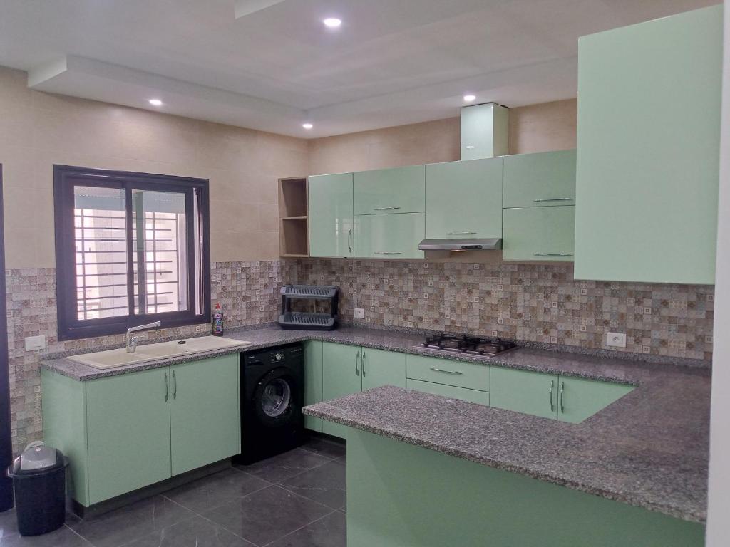 Kuchyň nebo kuchyňský kout v ubytování DarNejib, ElWafa city - north Hammamet