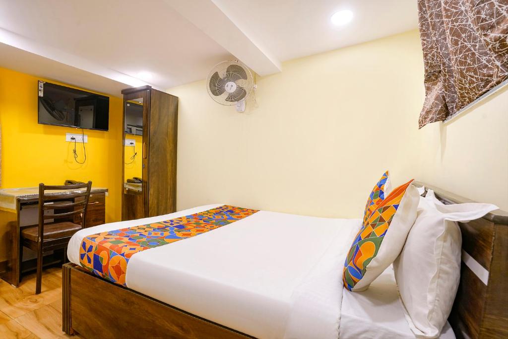 Postelja oz. postelje v sobi nastanitve FabHotel Metro Galaxy Inn