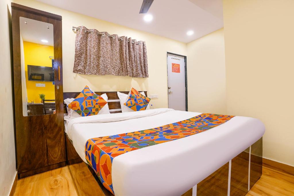 Postelja oz. postelje v sobi nastanitve FabHotel Metro Galaxy Inn