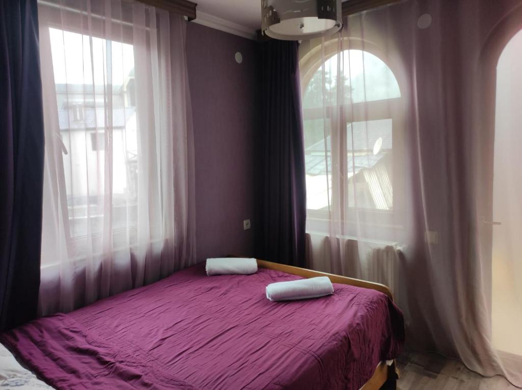 Letto o letti in una camera di Ushba House