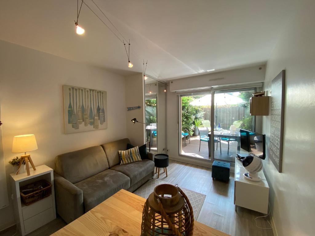 Et opholdsområde på C208 Studio Cabine avec Terrasse proche Plage