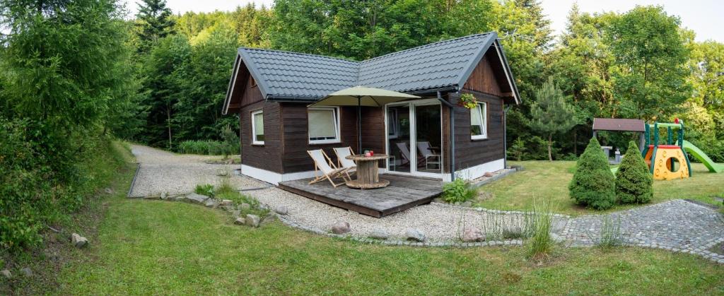 Vonkajšia záhrada v ubytovaní RESETówka nr 2 - domek rodzinny na odludziu