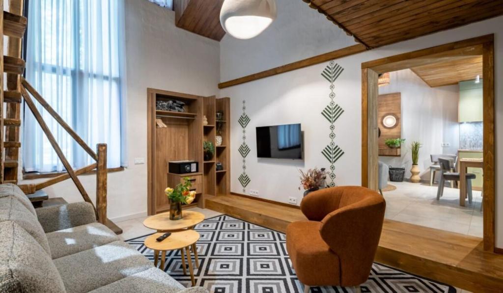 TV a/nebo společenská místnost v ubytování Drevny Grad Park-hotel