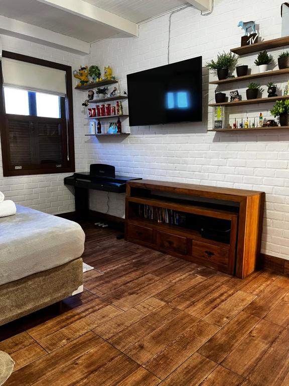 TV a/nebo společenská místnost v ubytování Casa do Point