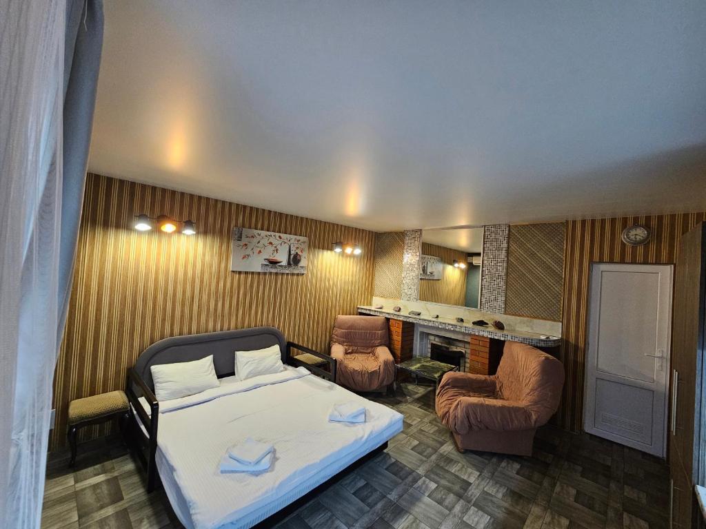 Postel nebo postele na pokoji v ubytování Guest House Filin