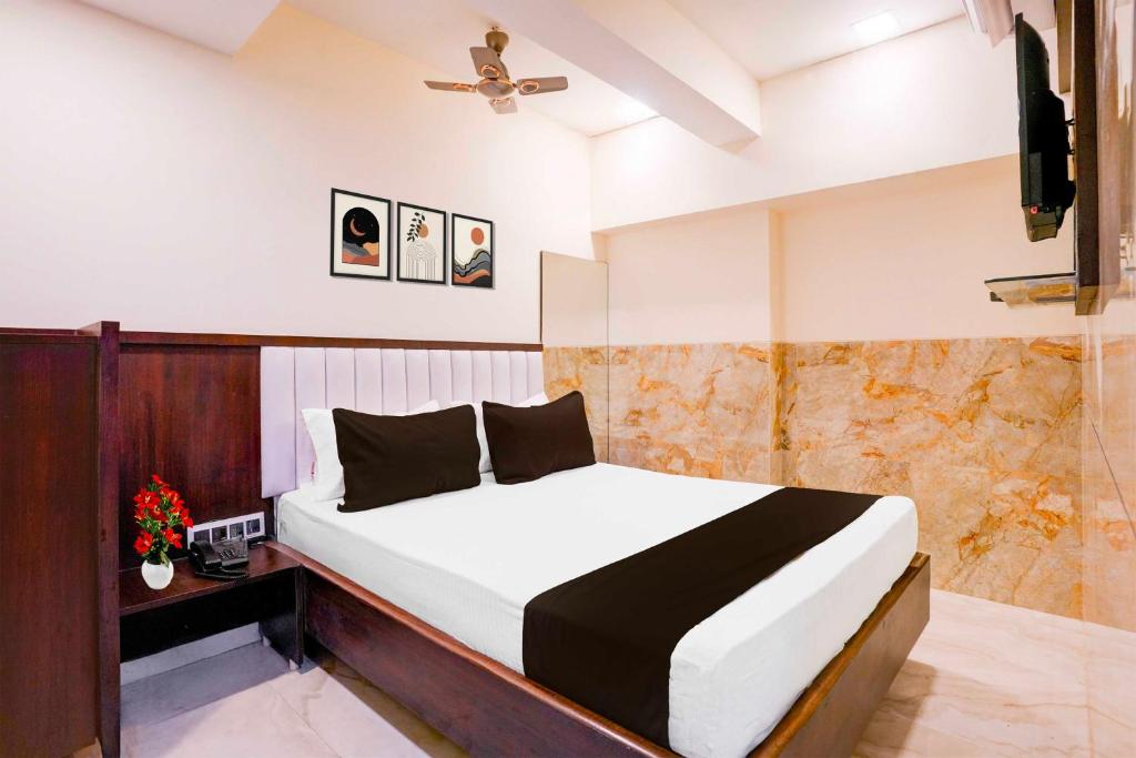 Ένα ή περισσότερα κρεβάτια σε δωμάτιο στο Hotel O Nandiwali Bus Terminal