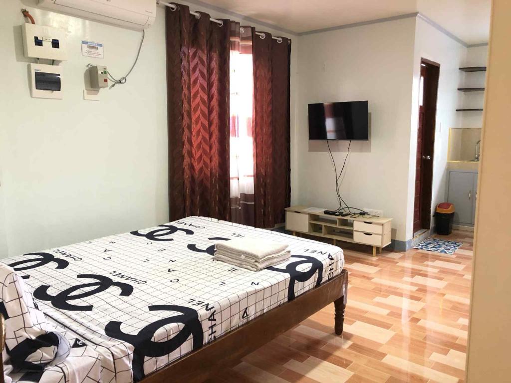 Postel nebo postele na pokoji v ubytování ZM Residence