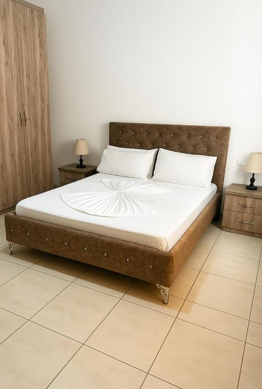 Postel nebo postele na pokoji v ubytování Residence David
