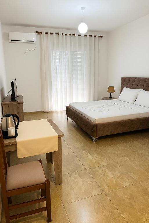 Postel nebo postele na pokoji v ubytování Residence David