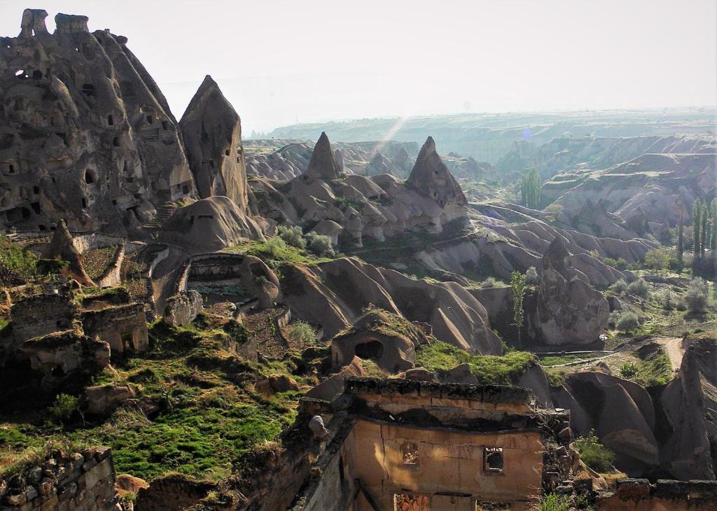 a view of a mountain with rock formations at Dancing Cloud Art House in Uçhisar