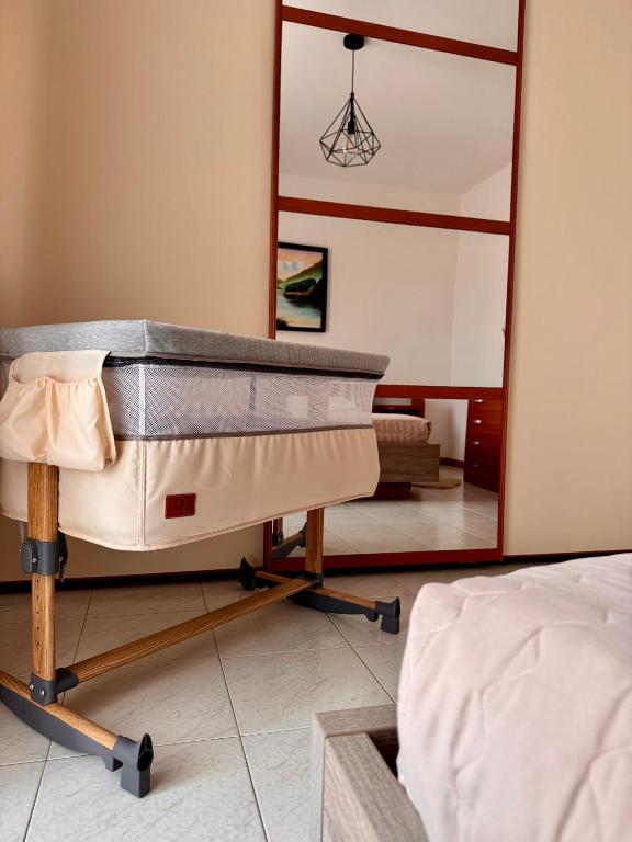 Postel nebo postele na pokoji v ubytování Garda Lake Holiday Apartments quadrilocale