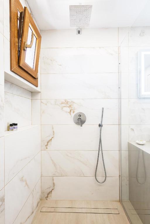 Łazienka w obiekcie Kallikratia Suites 1