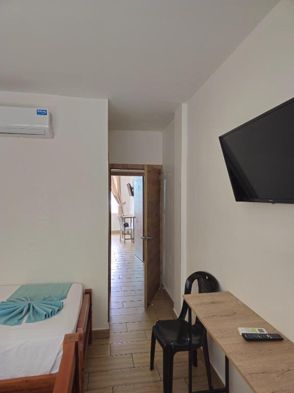 Postel nebo postele na pokoji v ubytování Coco Beach