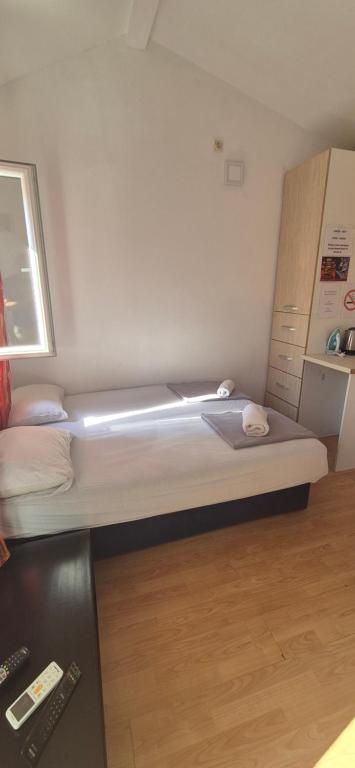 Postel nebo postele na pokoji v ubytování Majka 2 Apartments