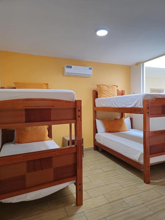 Postel nebo postele na pokoji v ubytování Coco Beach