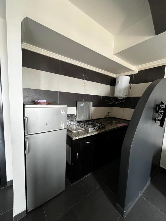Kuchyň nebo kuchyňský kout v ubytování Solmar Apartments Oued Lou