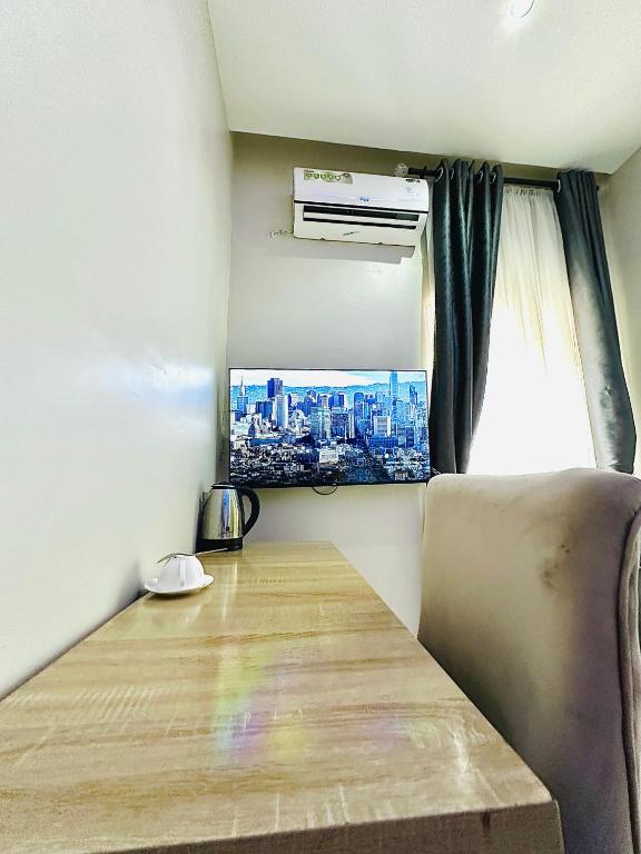 TV a/nebo společenská místnost v ubytování Hotel AREX