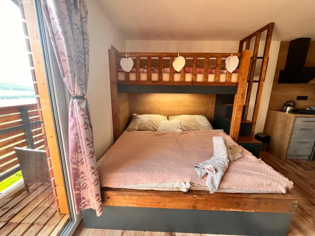 Postel nebo postele na pokoji v ubytování Chata POD HOUBOVÝM VRCHEM 2