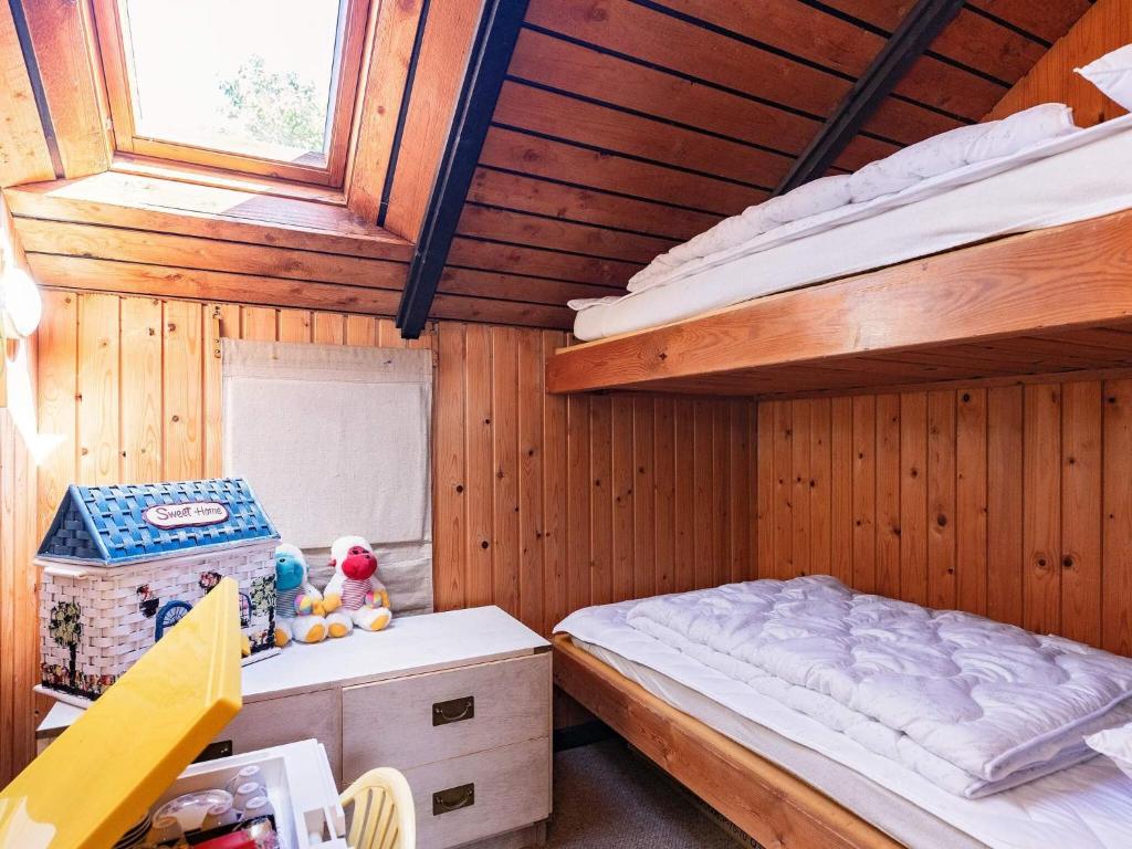 Postel nebo postele na pokoji v ubytování 8 person holiday home in Løgstør-By Traum